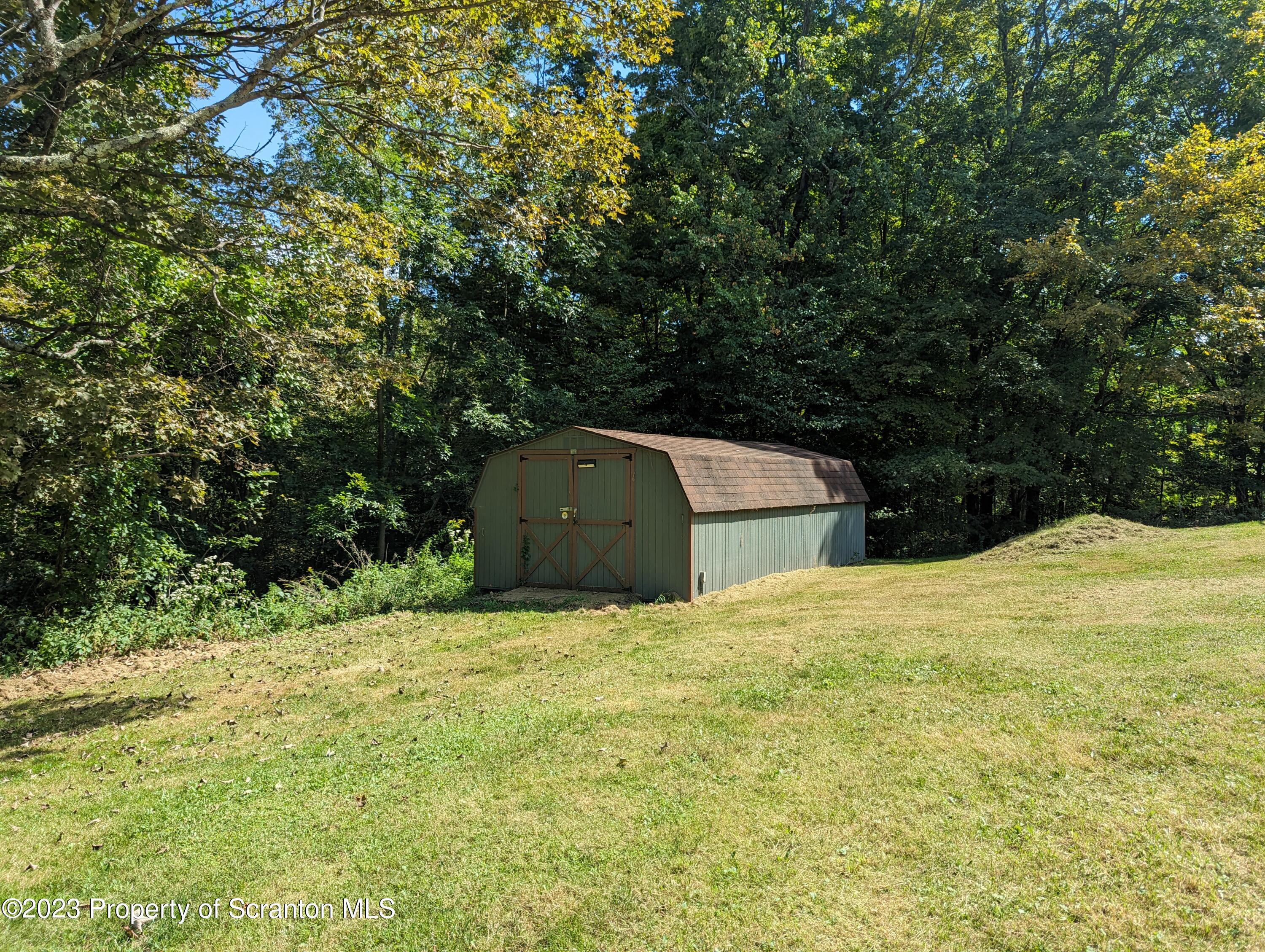 440 Tiffany Road Kingsley, PA 18826 - Photo 34 of 40 a big yard with large trees