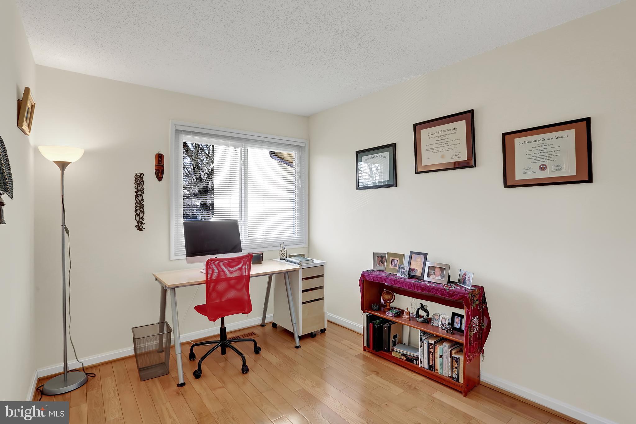 2413 Southgate Square Reston, VA 20191 - Photo 16 of 26 a living room with furniture and a wooden floor