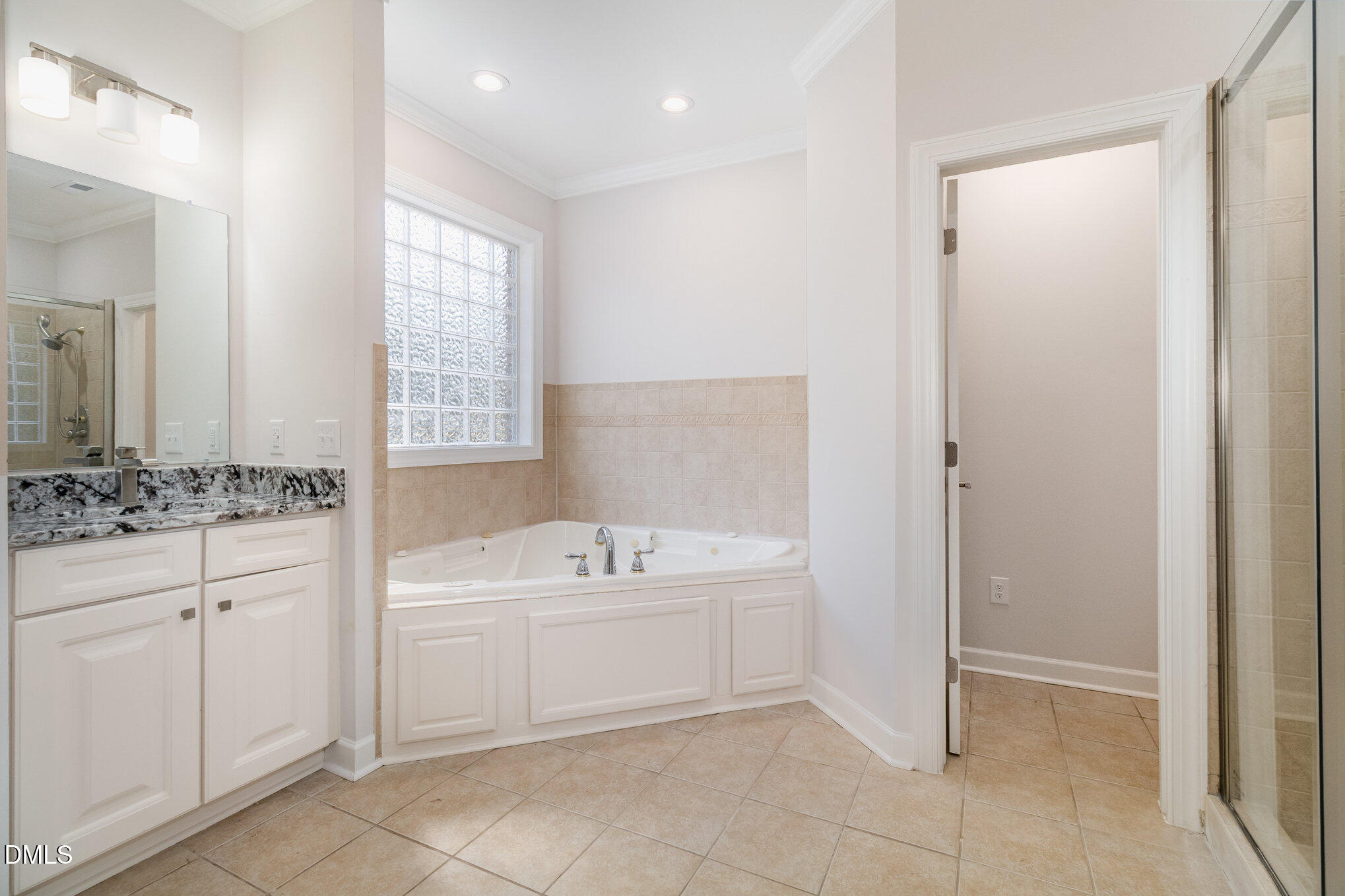 42 Racquet Court Sanford, NC 27332 - Photo 13 of 23 a bathroom with a sink a toilet and a bathtub
