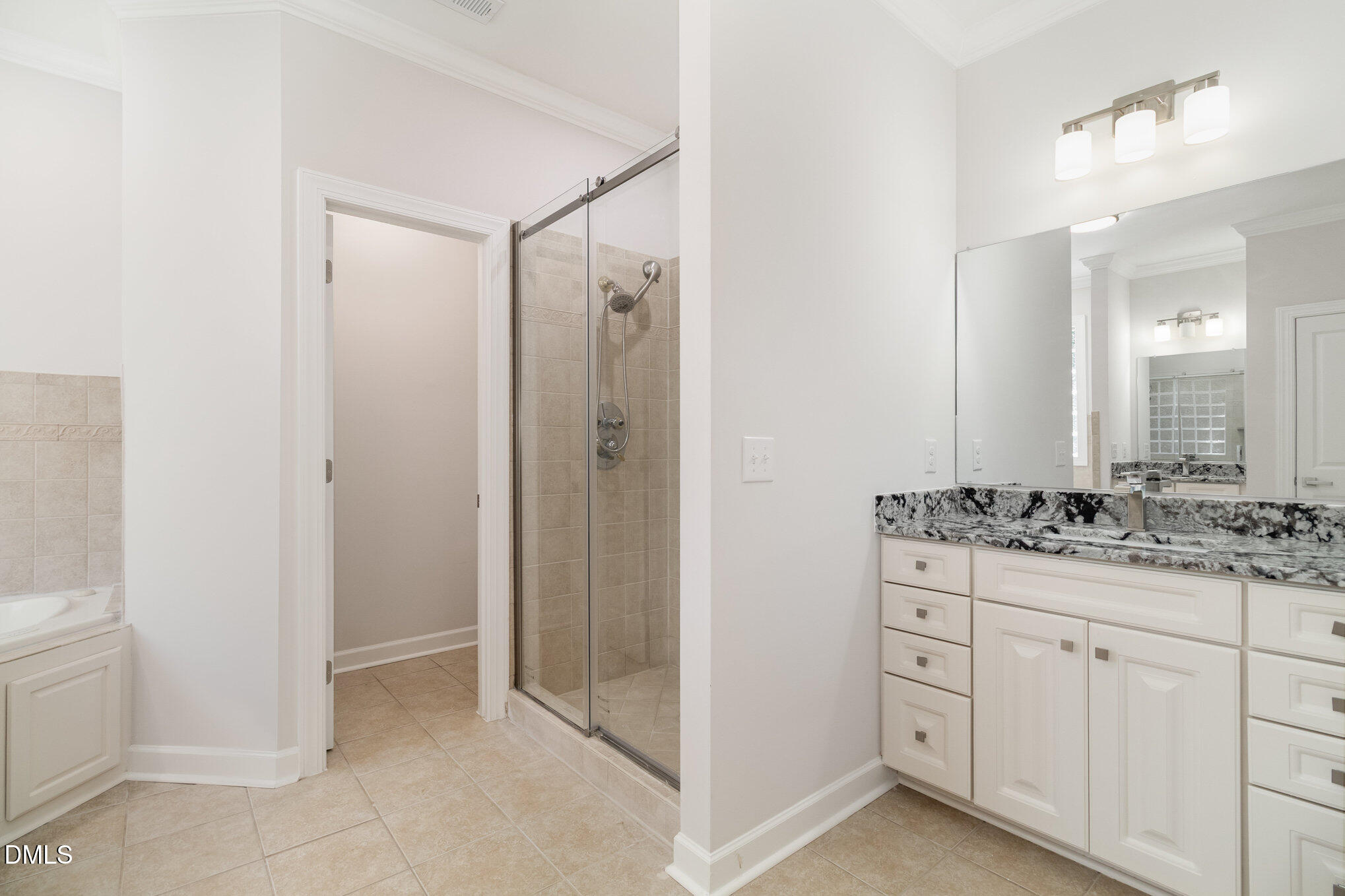 42 Racquet Court Sanford, NC 27332 - Photo 14 of 23 a bathroom with a granite countertop sink a mirror and a shower