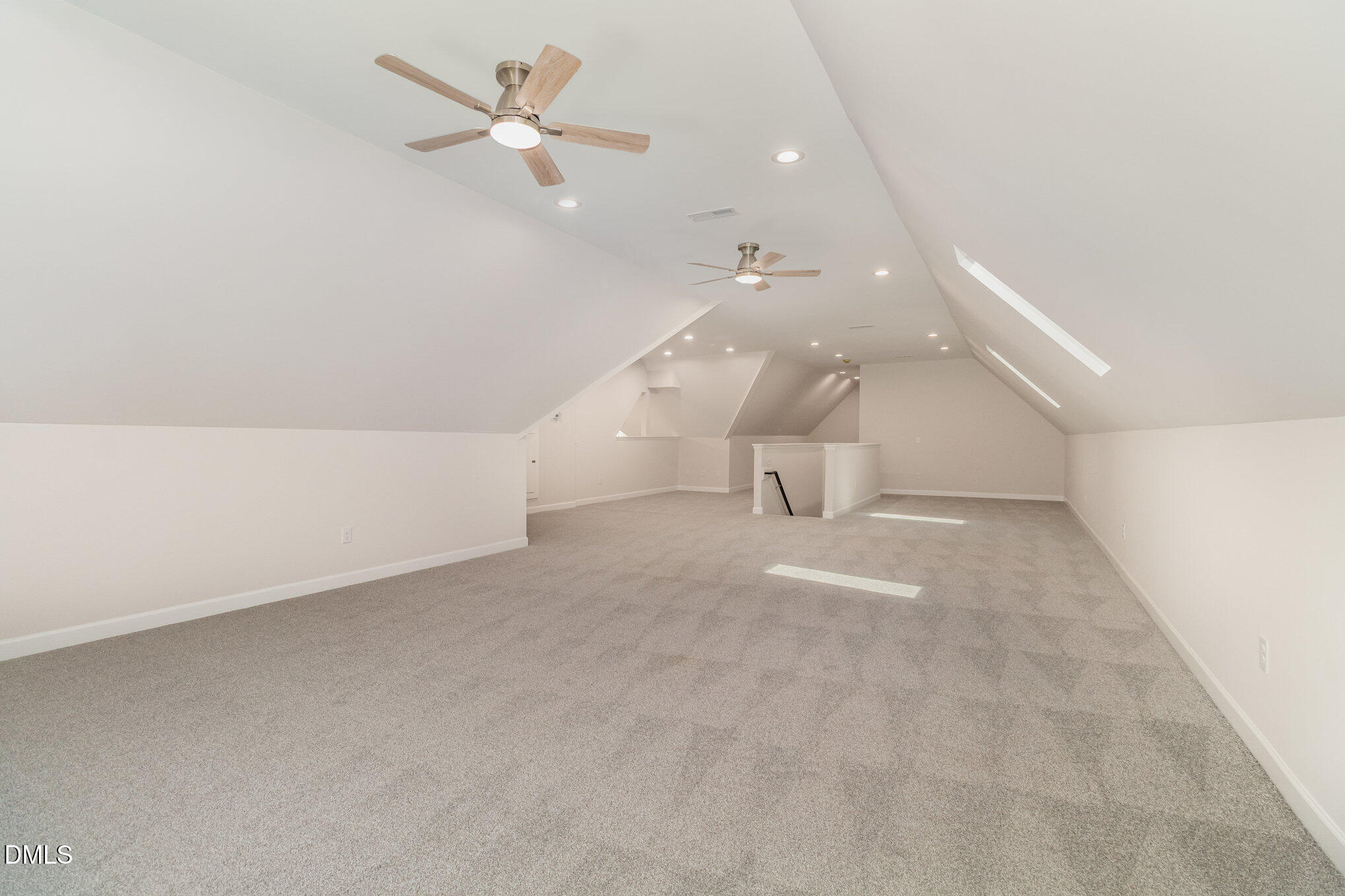 42 Racquet Court Sanford, NC 27332 - Photo 18 of 23 en empty room with ceiling fan and window