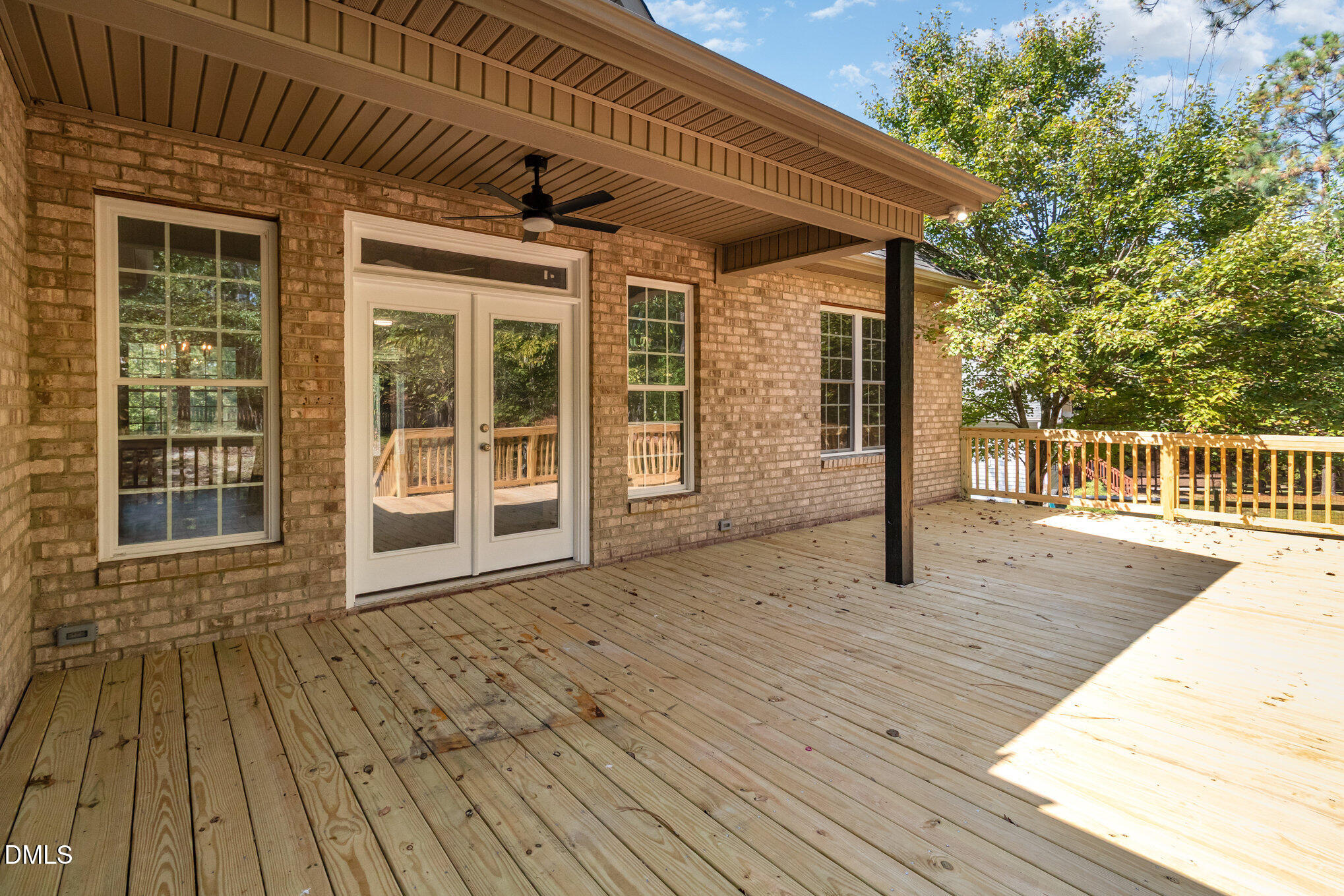 42 Racquet Court Sanford, NC 27332 - Photo 19 of 23 a porch with wooden floor and outdoor space