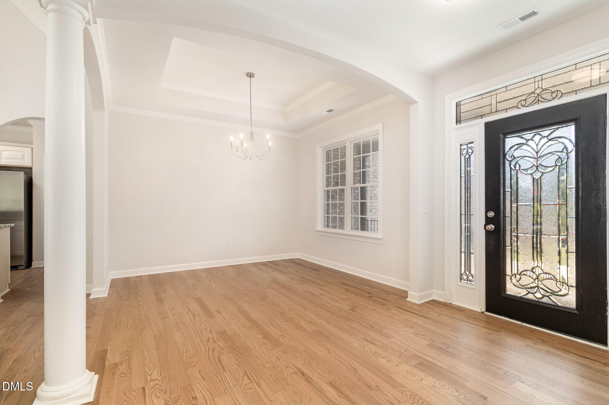 42 Racquet Court Sanford, NC 27332 - Photo 5 of 23 an empty room with windows and entrance