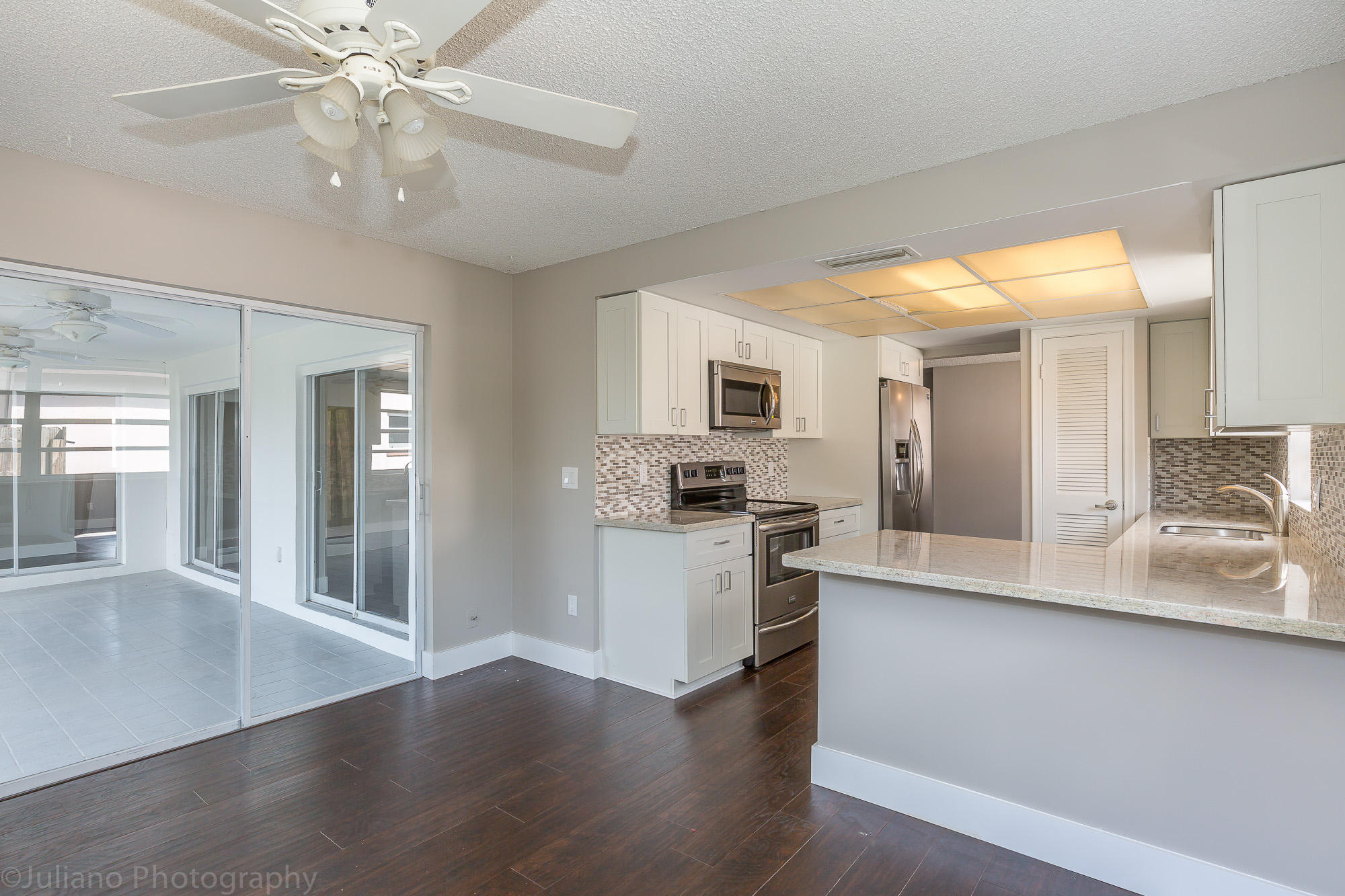 22748 Southwest 66th Avenue Boca Raton, FL 33428 - Photo 6 of 23 new kitchen, patio view