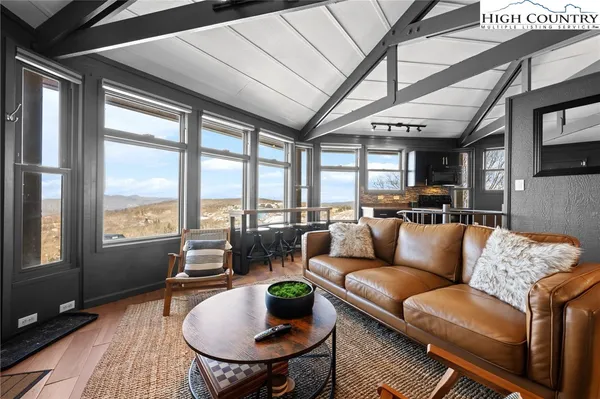 a bathroom with a toilet a sink and a mirror