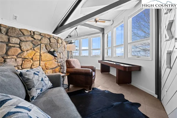 a front view of a house with parking space