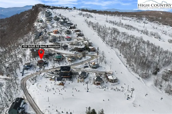 a view of a house with a mountain