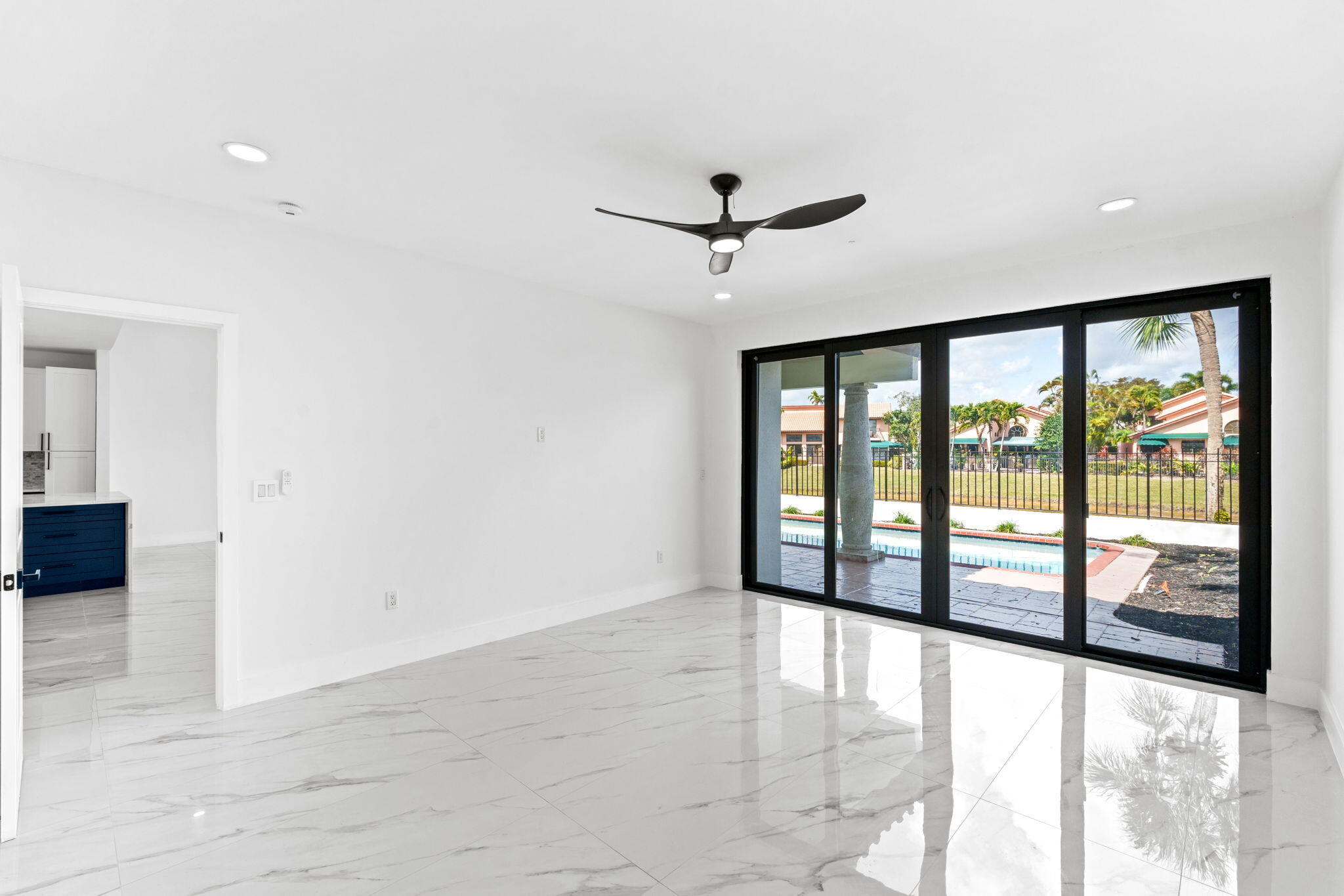 6567 Via Benita Boca Raton, FL 33433 - Photo 20 of 63 a view of an empty room with a window