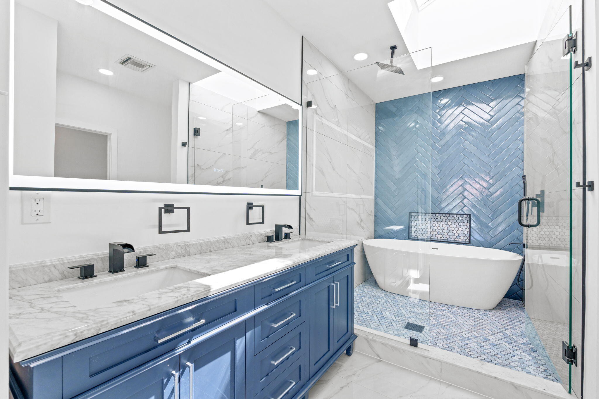 6567 Via Benita Boca Raton, FL 33433 - Photo 21 of 63 a bathroom with a granite countertop sink mirror and bathtub