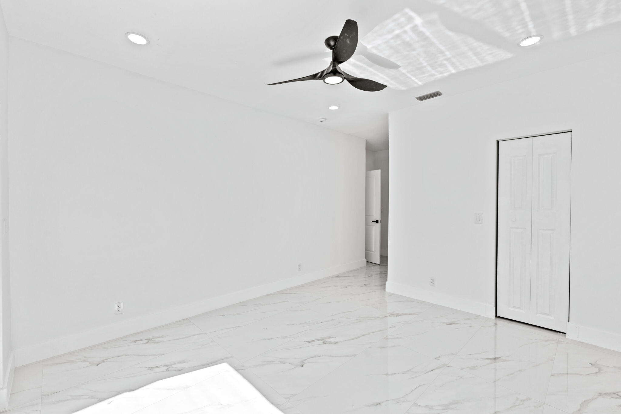 6567 Via Benita Boca Raton, FL 33433 - Photo 27 of 63 a view of a livingroom and a hallway