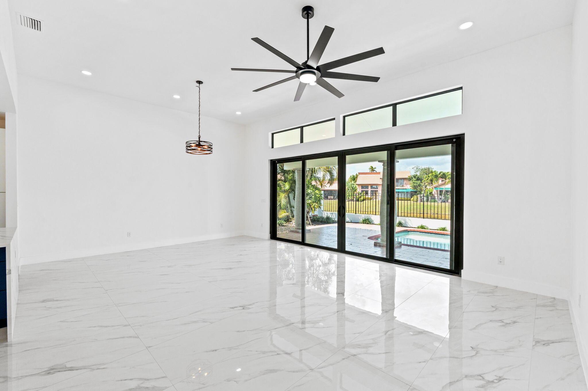 6567 Via Benita Boca Raton, FL 33433 - Photo 34 of 63 a view of an empty room with a window