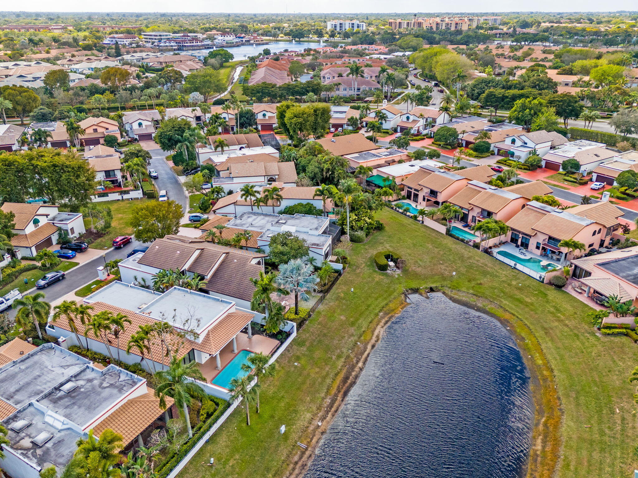 6567 Via Benita Boca Raton, FL 33433 - Photo 59 of 63 an aerial view of a houses with a swimming pool