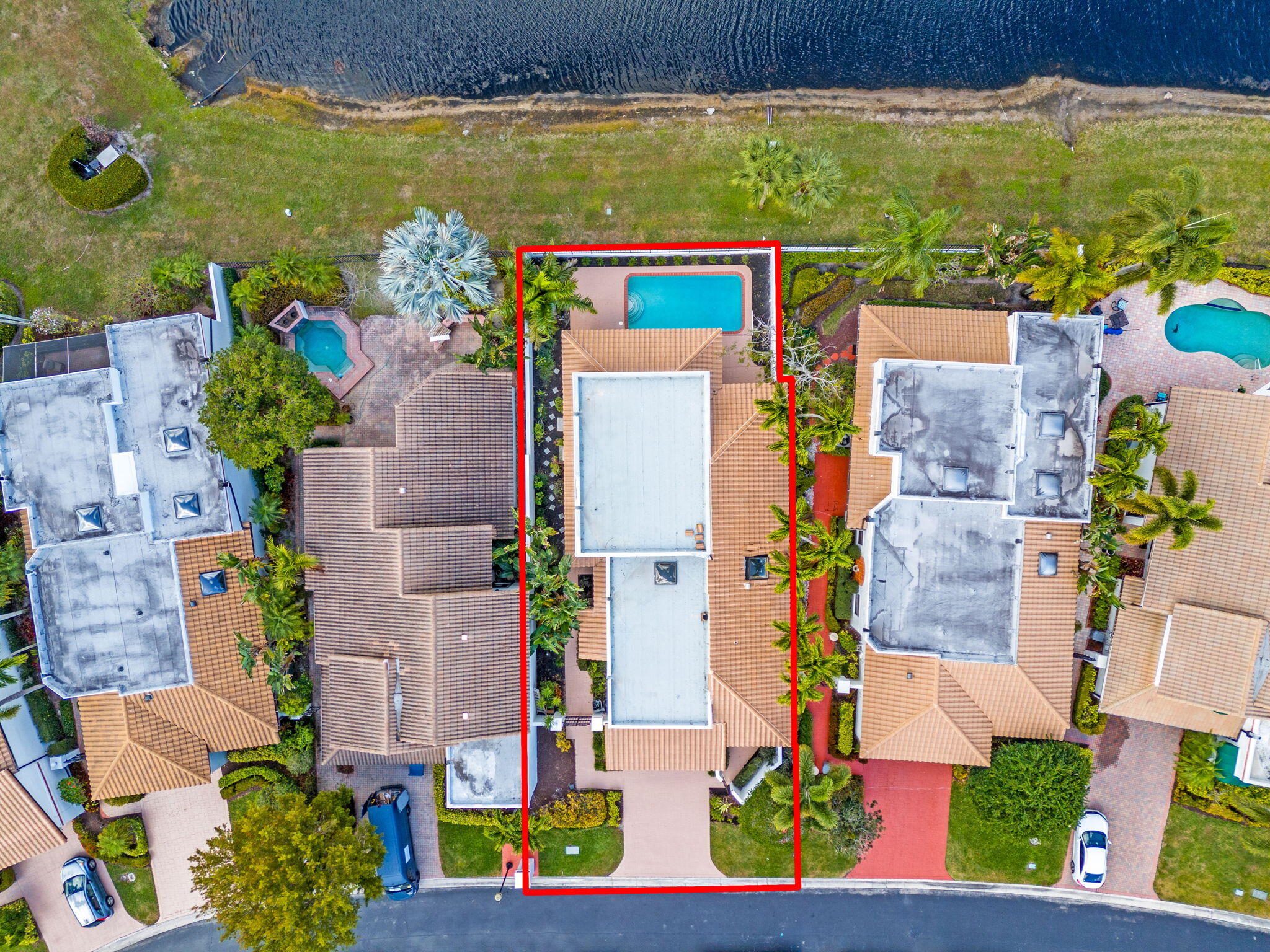 6567 Via Benita Boca Raton, FL 33433 - Photo 60 of 63 aerial view of a house with a yard and lake view