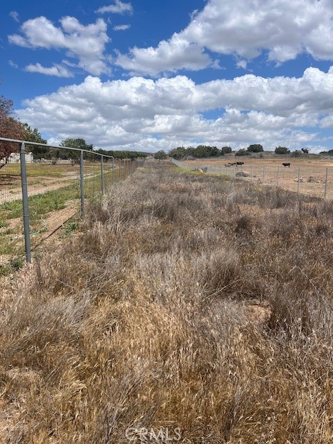 19 Acres Clarissa Lake Perris, CA 92570 - Photo 8 of 12 a view of a lake with houses in the back