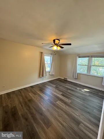 a view of a big room with a yard