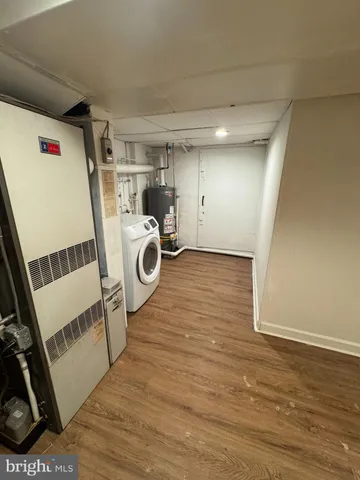 a bathroom with a bathtub and a sink