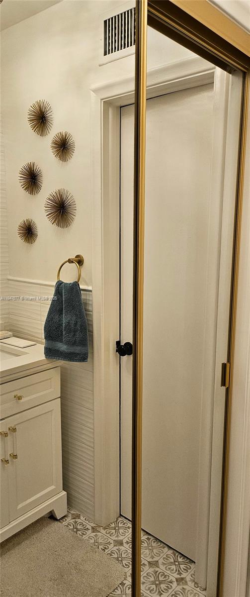 10872 Lake Front Place Boca Raton, FL 33498 - Photo 23 of 57 Vanity of bathroom and extra closet