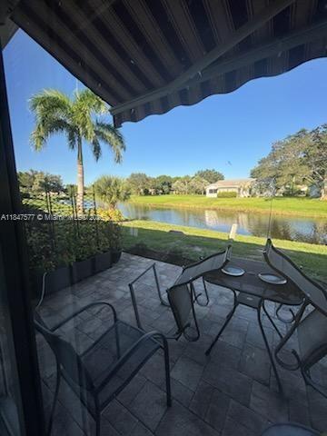 10872 Lake Front Place Boca Raton, FL 33498 - Photo 46 of 57 Rear Patio with Awning opened view
