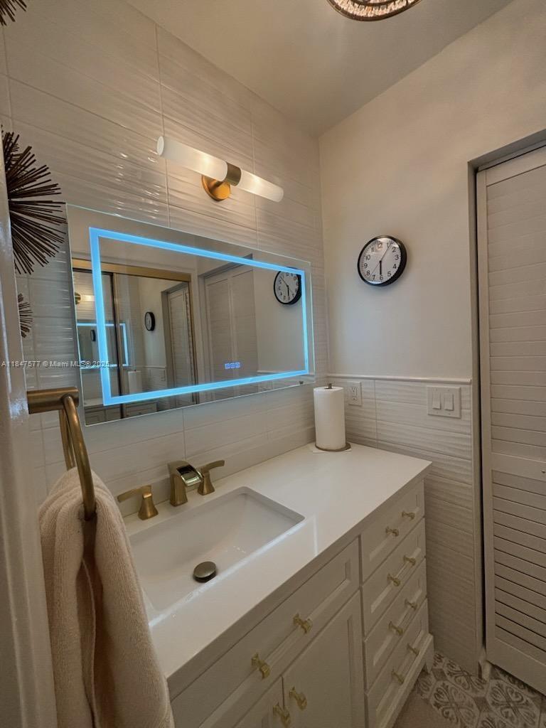10872 Lake Front Place Boca Raton, FL 33498 - Photo 48 of 57 Master Bathroom with Mirror lights on