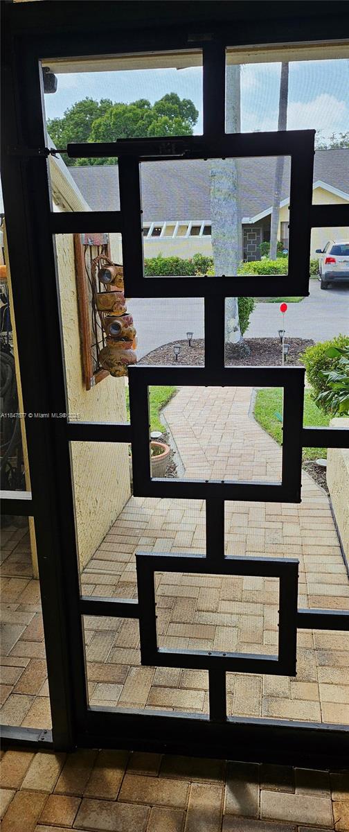 10872 Lake Front Place Boca Raton, FL 33498 - Photo 5 of 57 Inside looking out