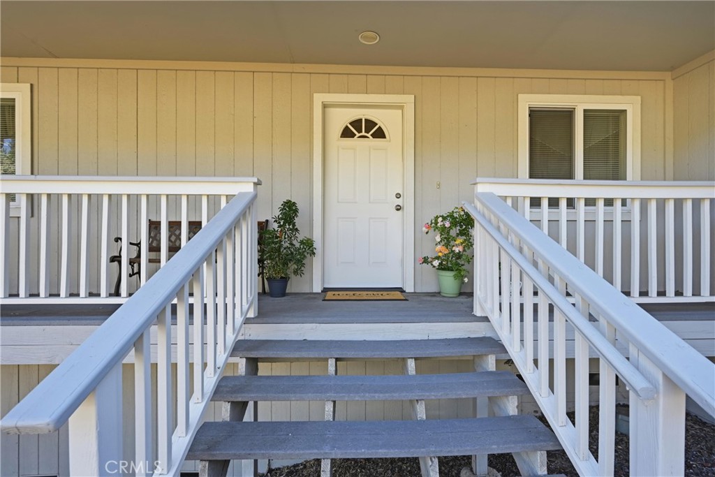 18685 Oak Grove Road Hidden Valley Lake, CA 95467 - Photo 34 of 52 a view of staircase with lots of windows and wooden floor