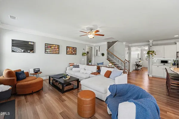 a bathroom with a granite countertop double vanity sink and a mirror