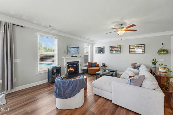 a spacious bathroom with a granite countertop sink mirror and shower