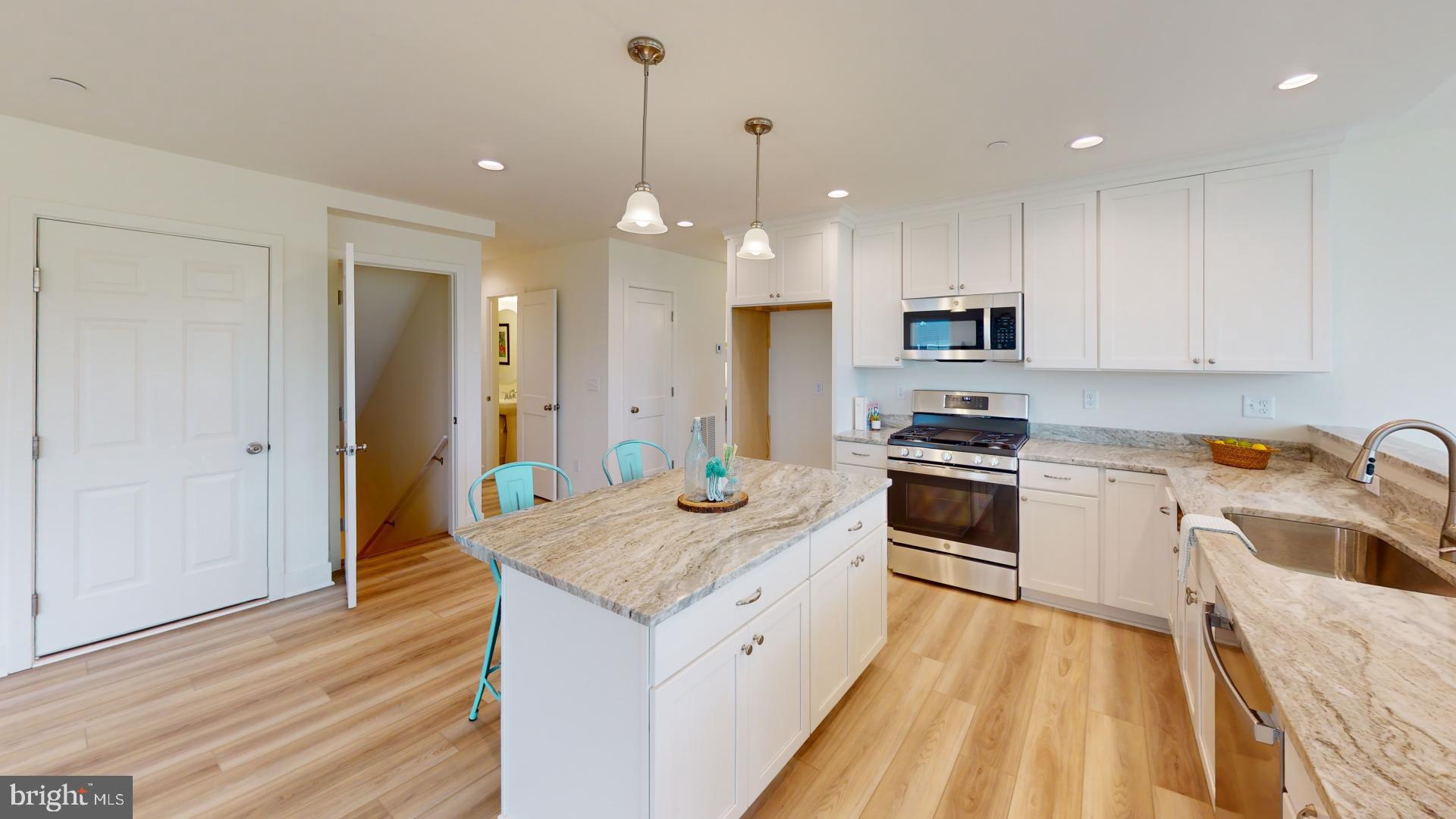 24730 Tribbett Circle Ridgely, MD 21660 - Photo 14 of 54 Island for extra seating and prep space