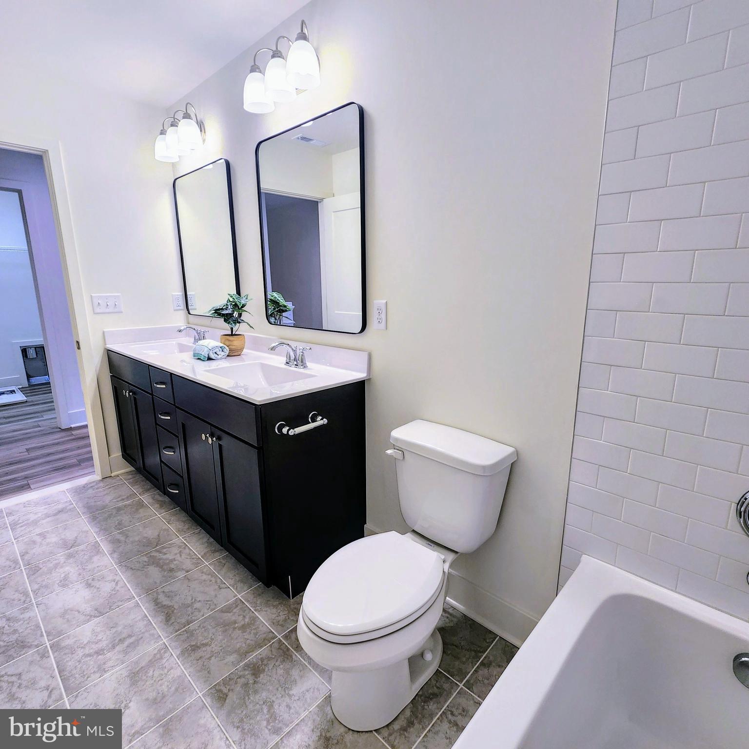 24730 Tribbett Circle Ridgely, MD 21660 - Photo 38 of 54 Tub/Shower has subway tile walls
