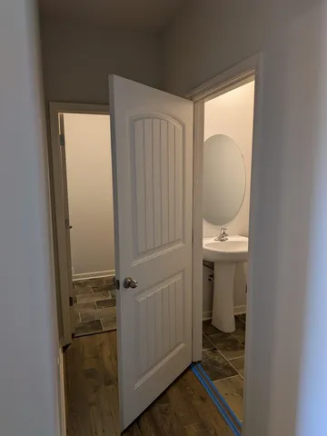 a bathroom with a sink and toilet