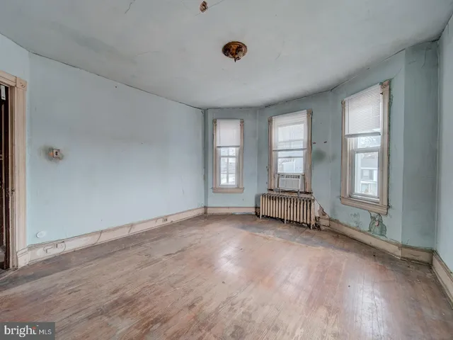 an empty room with windows