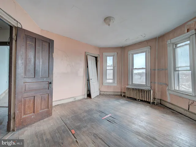 an empty room with windows