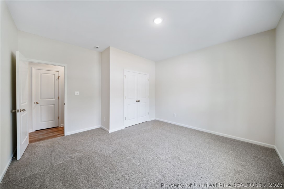 4052 Lofton Street Wade, NC 28395 - Photo 13 of 22 a view of an empty room