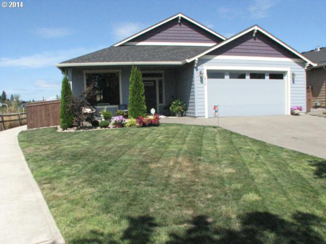 3702 North 3rd Circle Ridgefield, WA 98642 - Photo 1 of 16 a view of a house with yard and porch