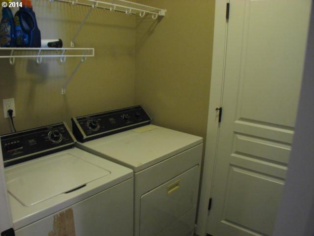 3702 North 3rd Circle Ridgefield, WA 98642 - Photo 11 of 16 a utility room with dryer and washer