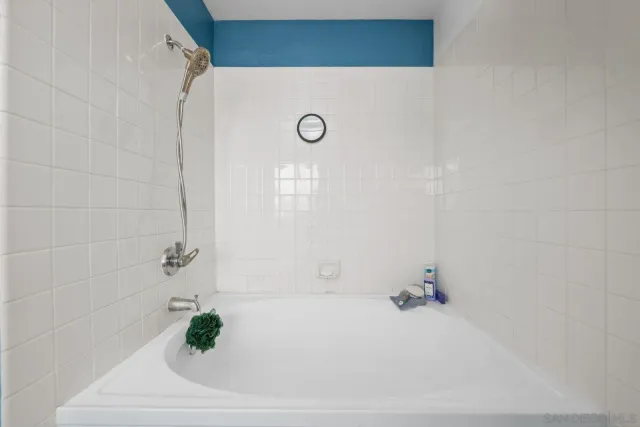 a bathroom with a bathtub