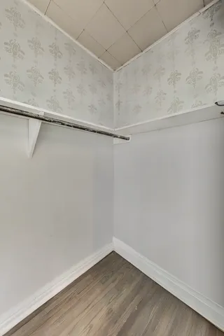 a view of an empty walk in closet