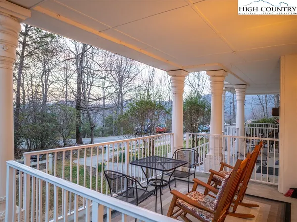 a view of a brick house with a large windows