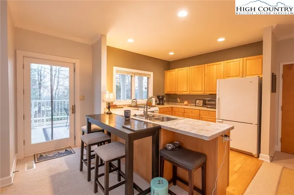 a kitchen with a stove and a sink