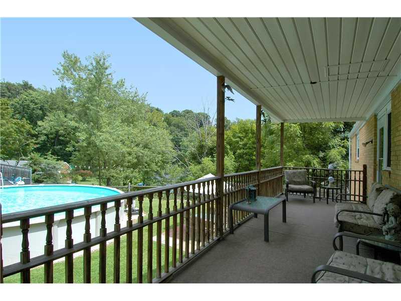 130 Easley Road Pittsburgh, PA 15237 - Photo 8 of 22 Patio/Deck. 2nd story covered balcony overlooks tranquil private pool.