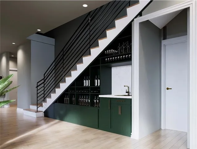 a view of entryway and hall with wooden floor
