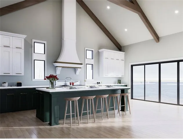 a kitchen with a sink and cabinets