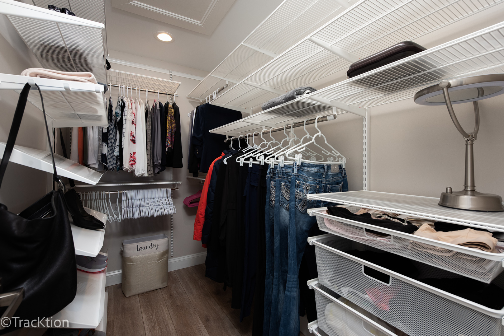 1610 McClure Road, Unit 1610 Aurora, IL 60505 - Photo 9 of 16 a view of walk in closet with clothes and shoes