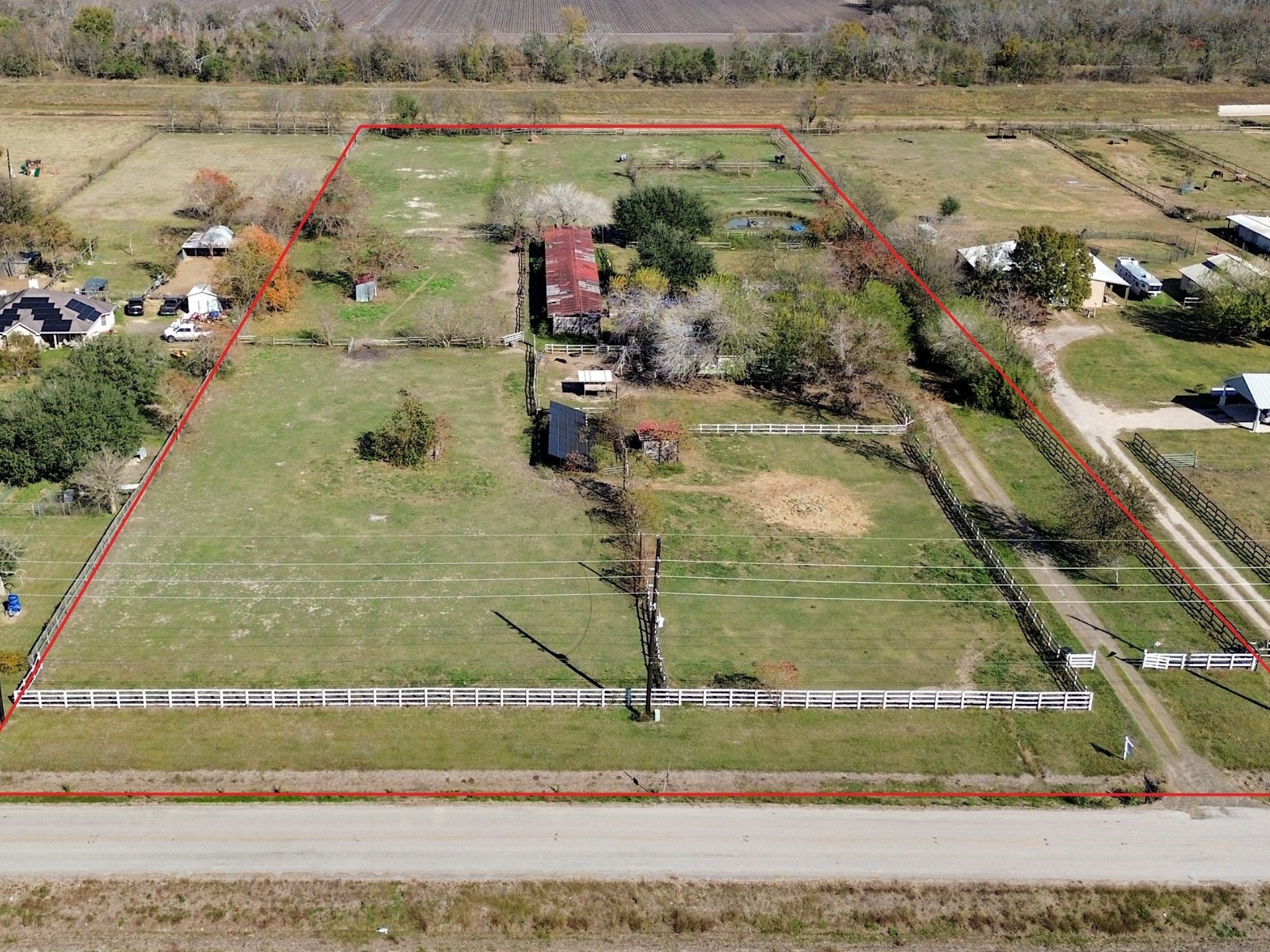 A sweeping aerial view showcasing the full 5.3+ acres, outlined for clarity—an expansive piece of unrestricted land ready for your vision.
