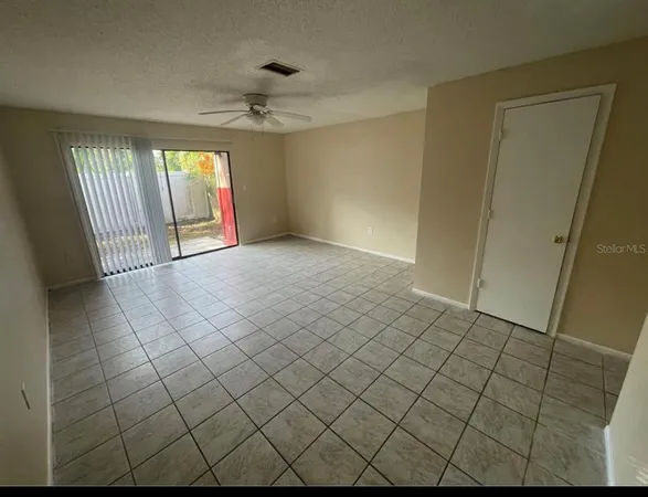 a kitchen with a sink and a stove