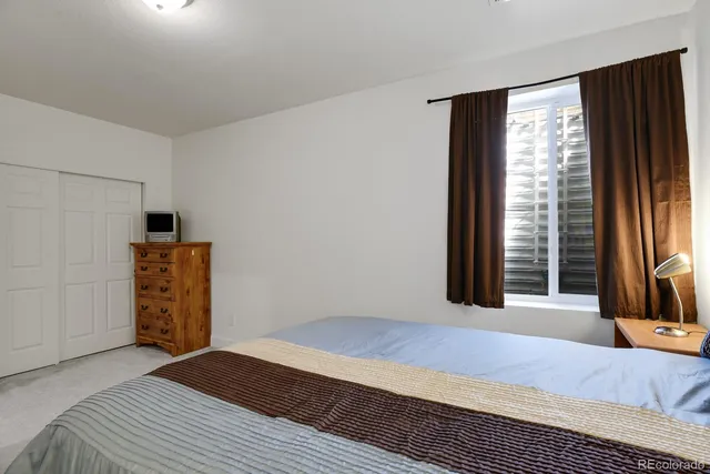 a picture of a cabinet with a white wall