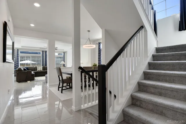 a view of entryway and hall with dining room