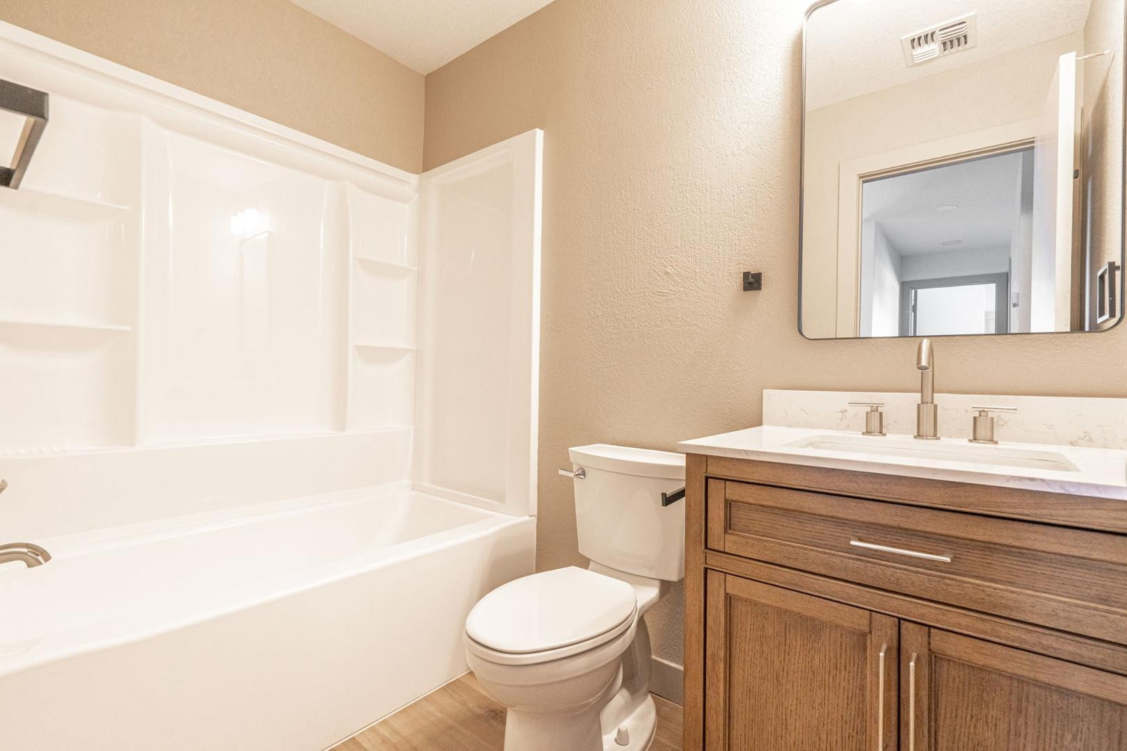 5739 West Monte Vista Road Phoenix, AZ 85035 - Photo 15 of 23 a bathroom with a sink toilet and shower