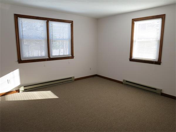 22 Lynch Road Wales, MA 01081 - Photo 5 of 11 an empty room with windows