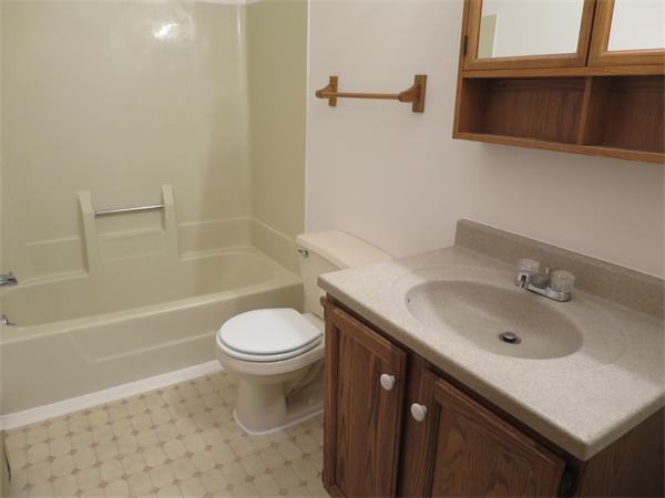 22 Lynch Road Wales, MA 01081 - Photo 6 of 11 a bathroom with a sink toilet vanity and shower